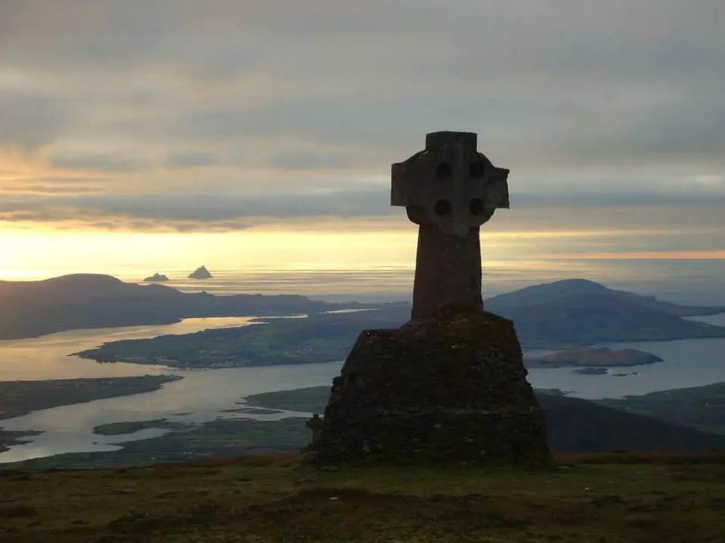 A cross on the top of a mountain